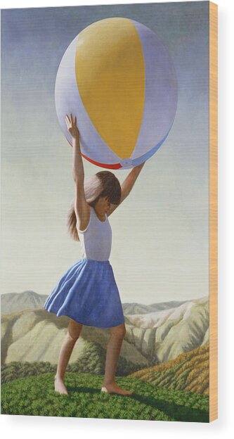 Girl Holding a Giant Beach Ball Wood Print
