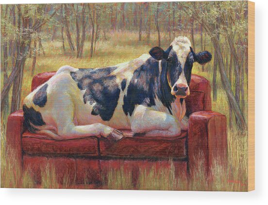 Cow Relaxing on a Red Sofa Wood Print