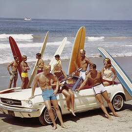 Friends Having Fun On Beach by Tom Kelley Archive