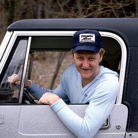 Larry Bird Poses In His Truck by Ken Regan