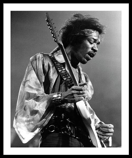 Iconic Guitarist on Stage Framed Print