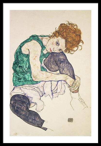 Seated Woman with Intense Expression Framed Print
