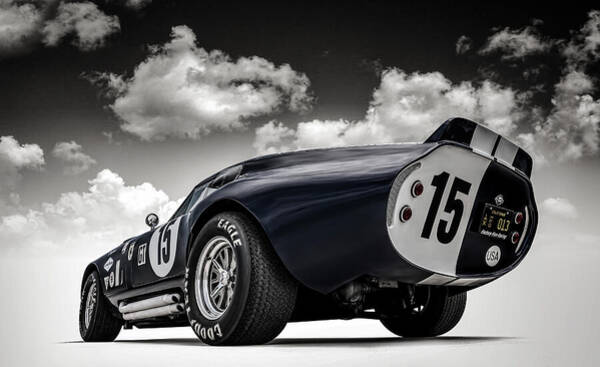 Vintage Race Car under Dramatic Sky Art Print